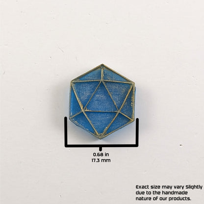 A graphic showing a blue and gold flat dangly d20 earring without a number or hardware on a white background. The graphic overlay shows the width of the d20 dangle as 0.68 inches or 17.33 mm. The bottom right corner has a disclaimer that reads, "Exact size may vary slightly due to the handmade nature of our products."