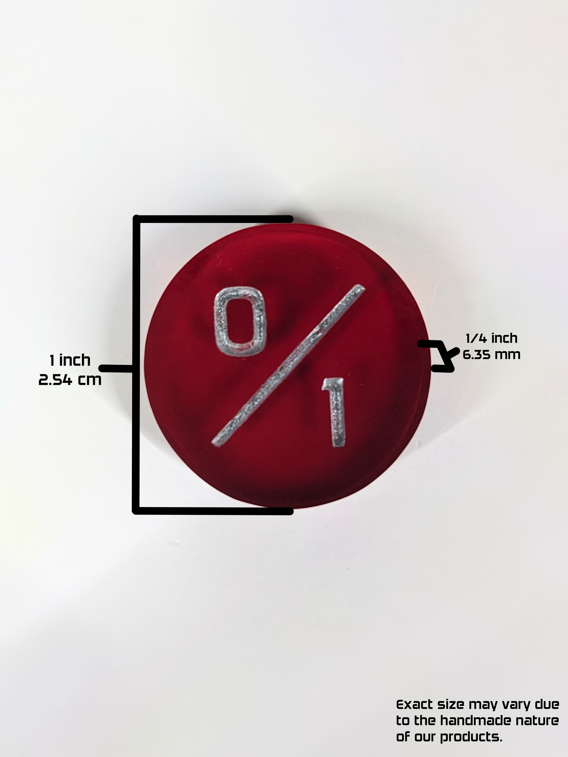 A top down photo of a red 0/1 token with a graphic overlay showing the size. The overlay shows the diameter of the token as 1 inch or 1.54 cm and the depth of the token as 1/4 inch or 6.35 mm. The bottom right of the image has a text disclaimer that reads, "Exact size may vary due to the handmade nature of our products."