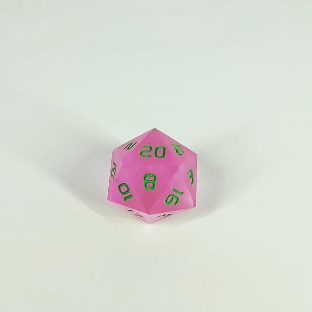A high angle gif of a standard d20 with pink/purple swirls and green numbers with the 20 face up on a white background. The image shifts from regular light to darkness, where the die starts to glow green.