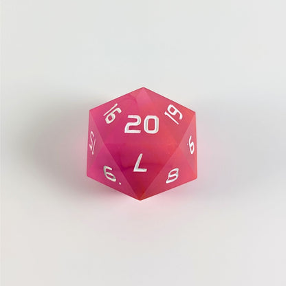 A magenta spindown d20 with white numbers and a right spin sits on a white background with the 20 face up.