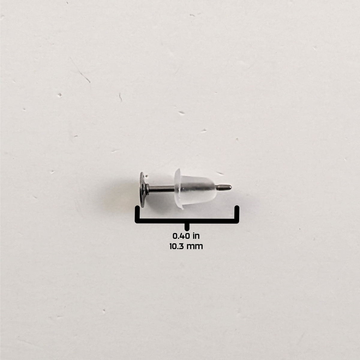 A size graphic of the earring post and bell shaped rubber back on a white background. It shows the length of the post as 10.3 mm or 0.40 in.