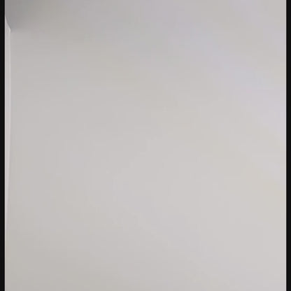 A video of the set of dagger shaped dnd dice that are orange and purple with black numbers rolling two at a time. First the two d20s are rolled and land near the top of the frame, then the d% and d10, then the d6 and d4 which lands poking partly out of frame, and finally the d8 and d12.