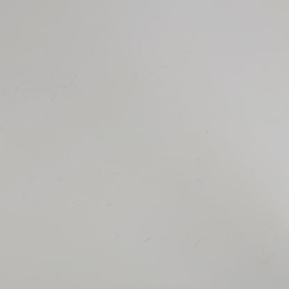 A large d20 that has subtle swirls of purple, blue, and pink with white numbers is rolled coming in from the bottom of the frame, and lands on a 9.