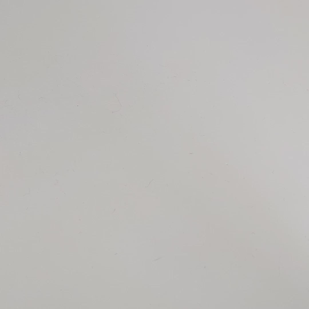 A large d20 that has swirls of orange, yellow, and a small amount of red with dark red numbers is rolled coming in from the bottom of the frame, and lands on a 1.